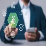 A businessman with an ISO 14001 environmental management icon