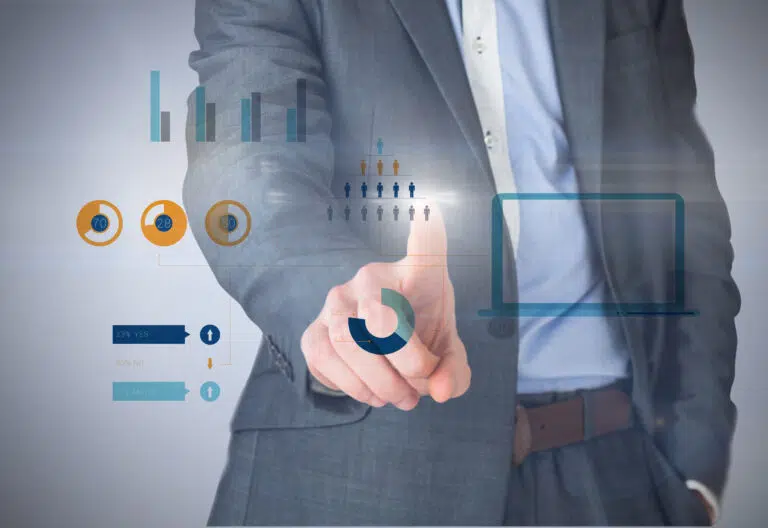 composite image businessman grey suit pointing against grey vignette